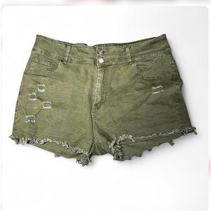 Green denim shorts with distressed details. Size 22